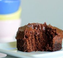 A rich & gooey chocolate mug cake you can make in the microwave,  under 200 calories for the entire thing! Full recipe: http://chocolatecoveredkatie.com/2011/11/06/one-minute-chocolate-cake/