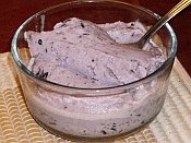 Bowl of homemade goat milk blueberry ice cream