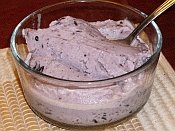 Bowl of homemade goat milk blueberry ice cream