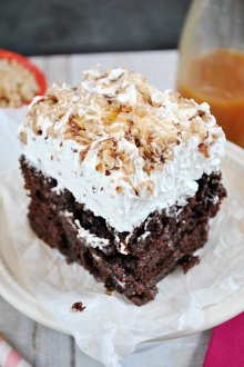 BTS Cake aka Poke Cake aka The BEST Cake you'll ever eat!! This super moist and decadent cake is smothered in whipped cream, Heath Toffee, and caramel sundae sauce | title=