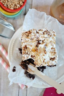 BTS Cake aka Poke Cake aka The BEST Cake you'll ever eat!! This super moist and decadent cake is smothered in whipped cream, Heath Toffee, and caramel sundae sauce | title=