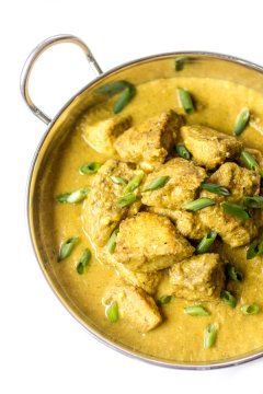 Creamy, spiced Chicken Korma is the stuff dreams are made of. Loosen up those pants and make this delectable Indian dish at home!