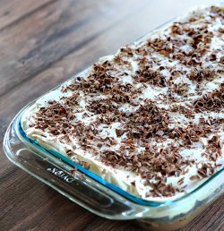 Mudslide Poke Cake - Chocolate cake infused with sweetened condensed milk, hot fudge, vodka, Kahlua and Baileys Irish Cream. An easy, delicious cake with a nice kick! | browneyedbaker.com