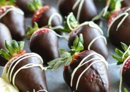 Let the strawberries sit until the chocolate coating is dry, then drizzle with melted white chocolate.