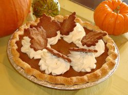 Pumpkin Pie Topped with Whipped Cream Dollups