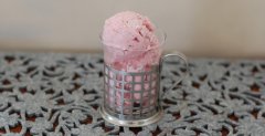 This Creamy Strawberry Ice Cream is so delicious no one will ever miss the dairy. It's made with coconut milk for it's richness,  and sweetened with pure maple syrup or honey. The maple syrup version is so good! - The Nourishing Gourmet